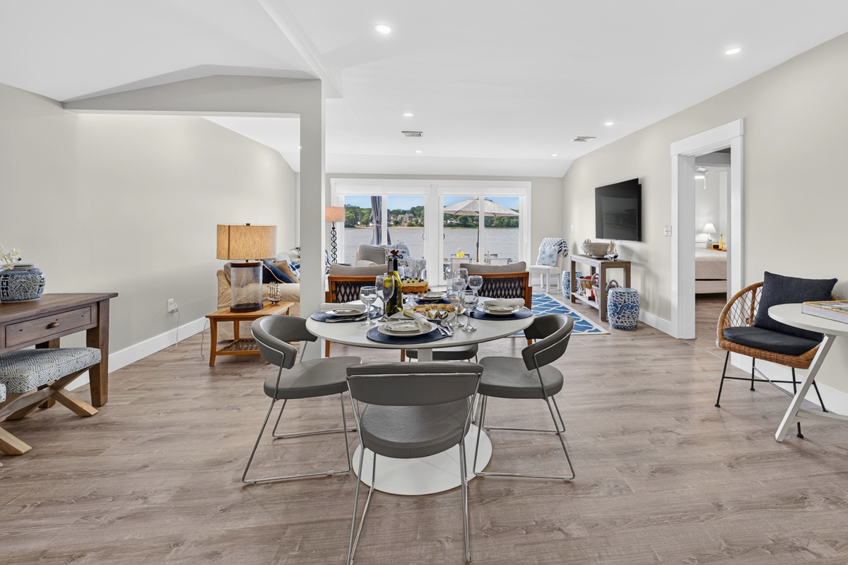 Bright, open-concept dining and living area designed for effortless gatherings with family and friends.