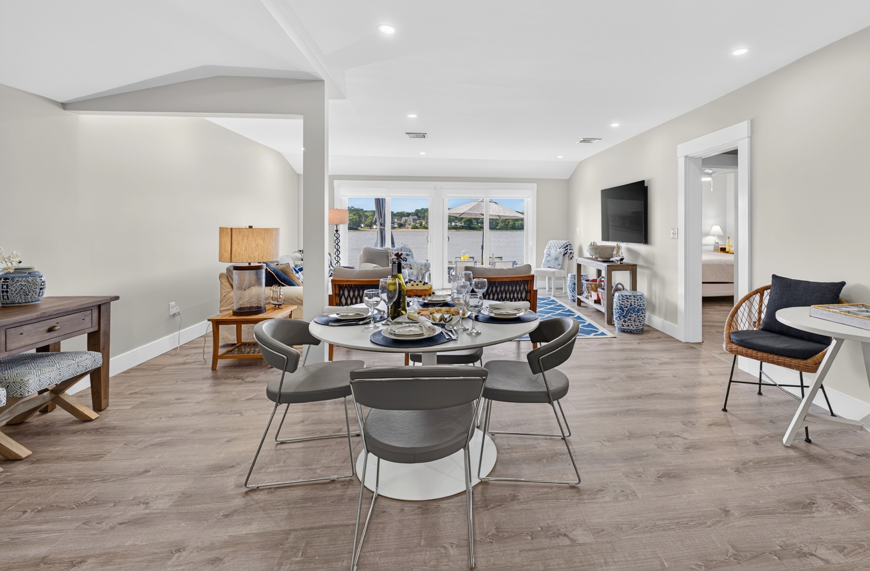 Bright, open-concept dining and living area designed for effortless gatherings with family and friends.