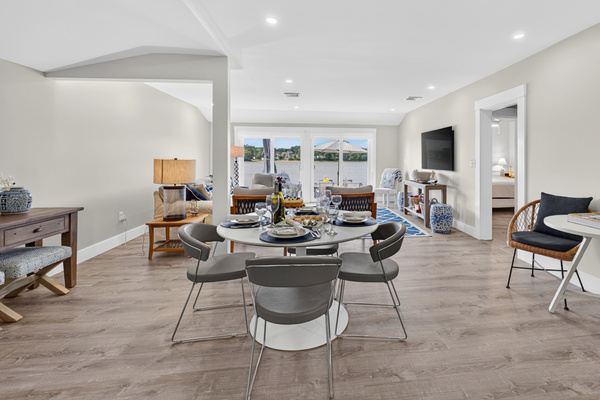 Bright, open-concept dining and living area designed for effortless gatherings with family and friends.