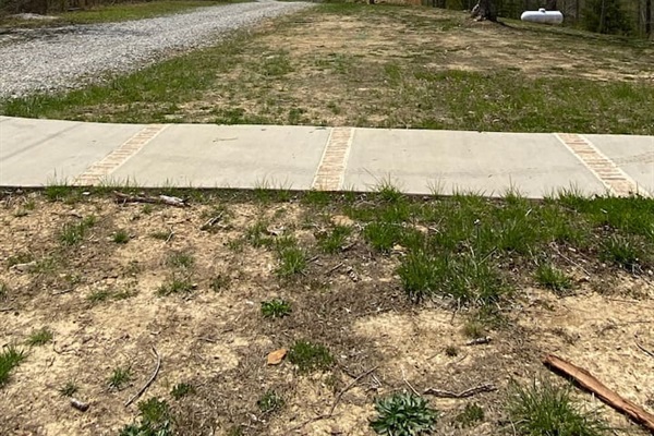 Long drive and plenty of places to park for truck and trailers loaded with RZRs.