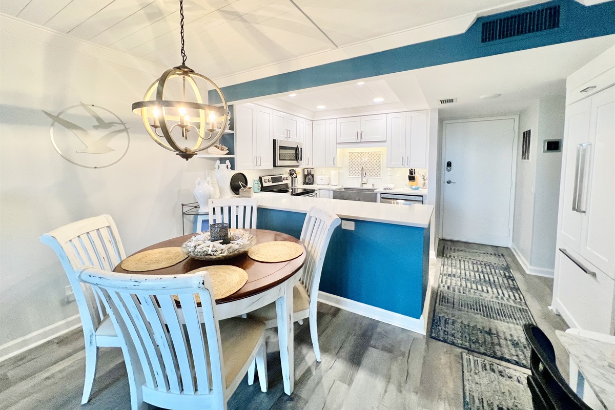 Bright dining space with coastal vibes, perfect for group meals or game night.