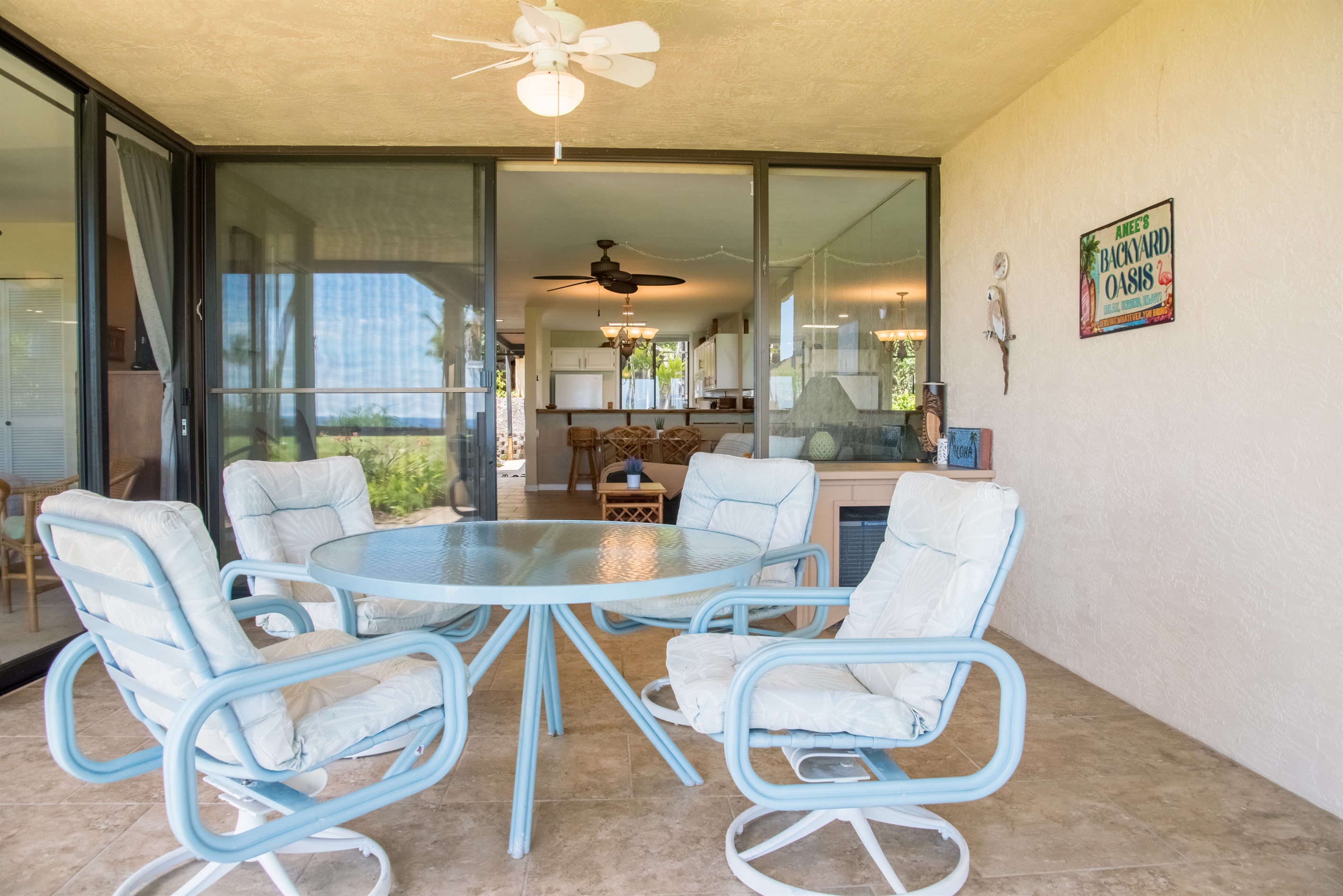 Dine alfresco style and enjoy the backyard oasis.