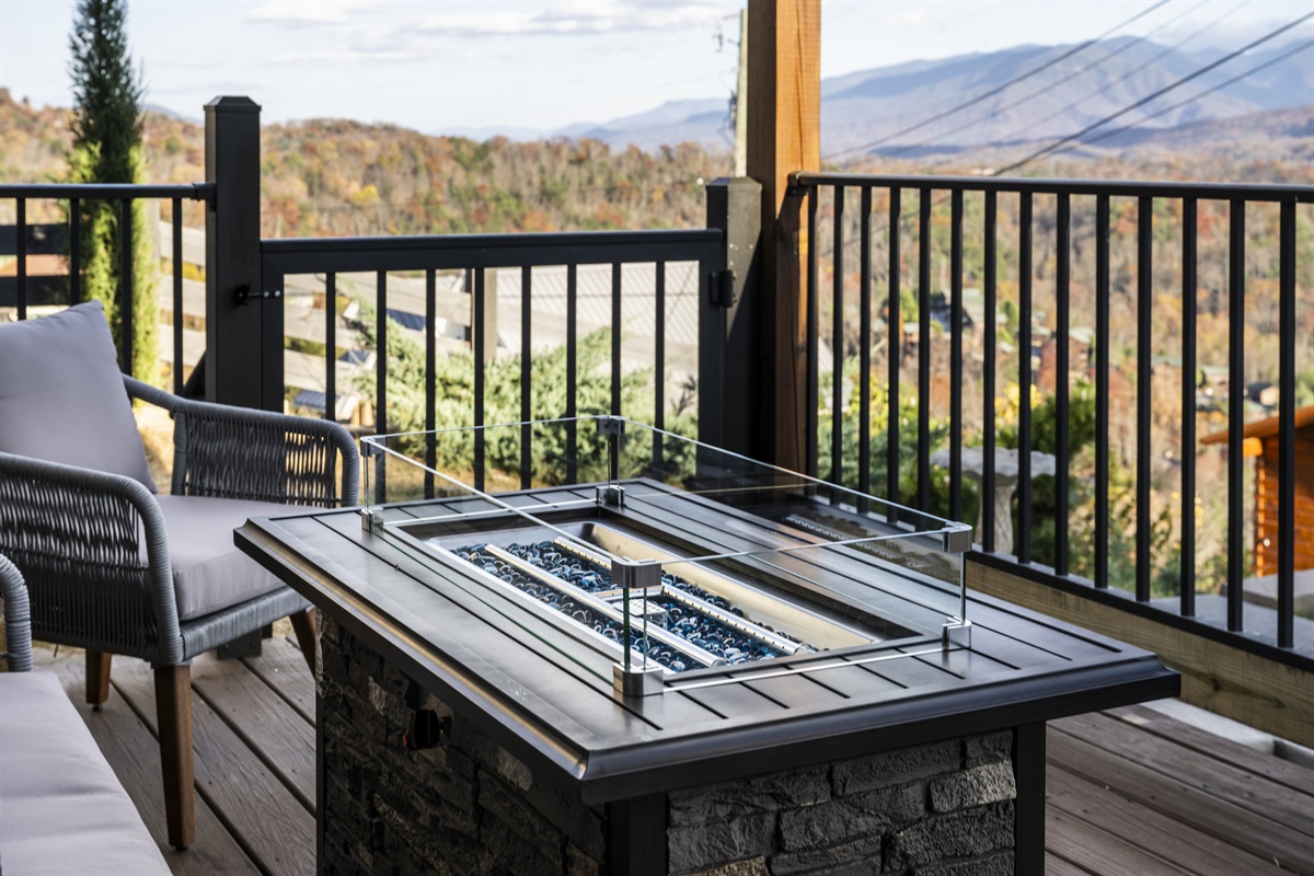 Gather around the gas fire pit, where warmth and mountain views create the perfect evening ambiance