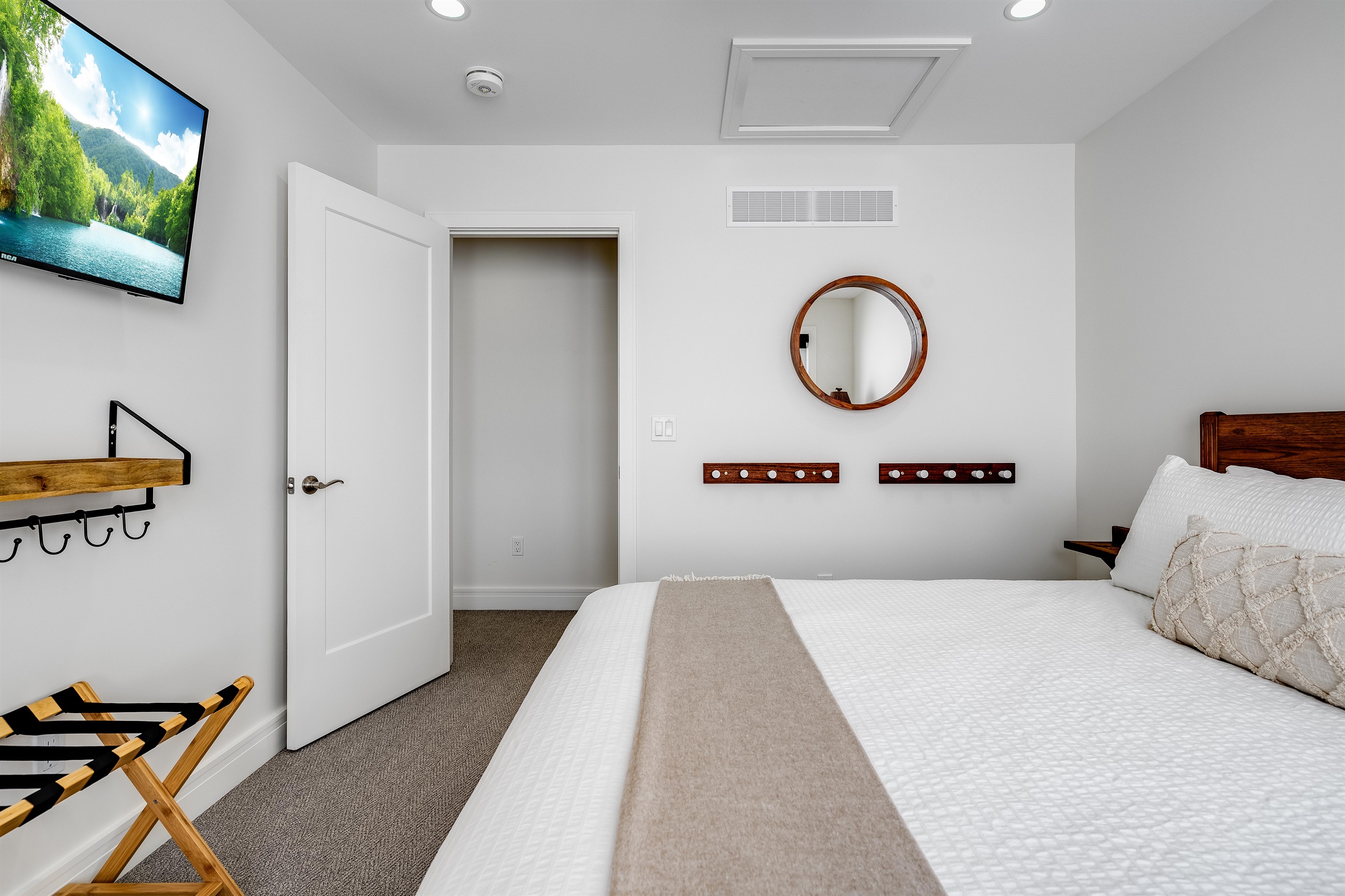 King Bedroom with, Neutral palette creates tranquility.