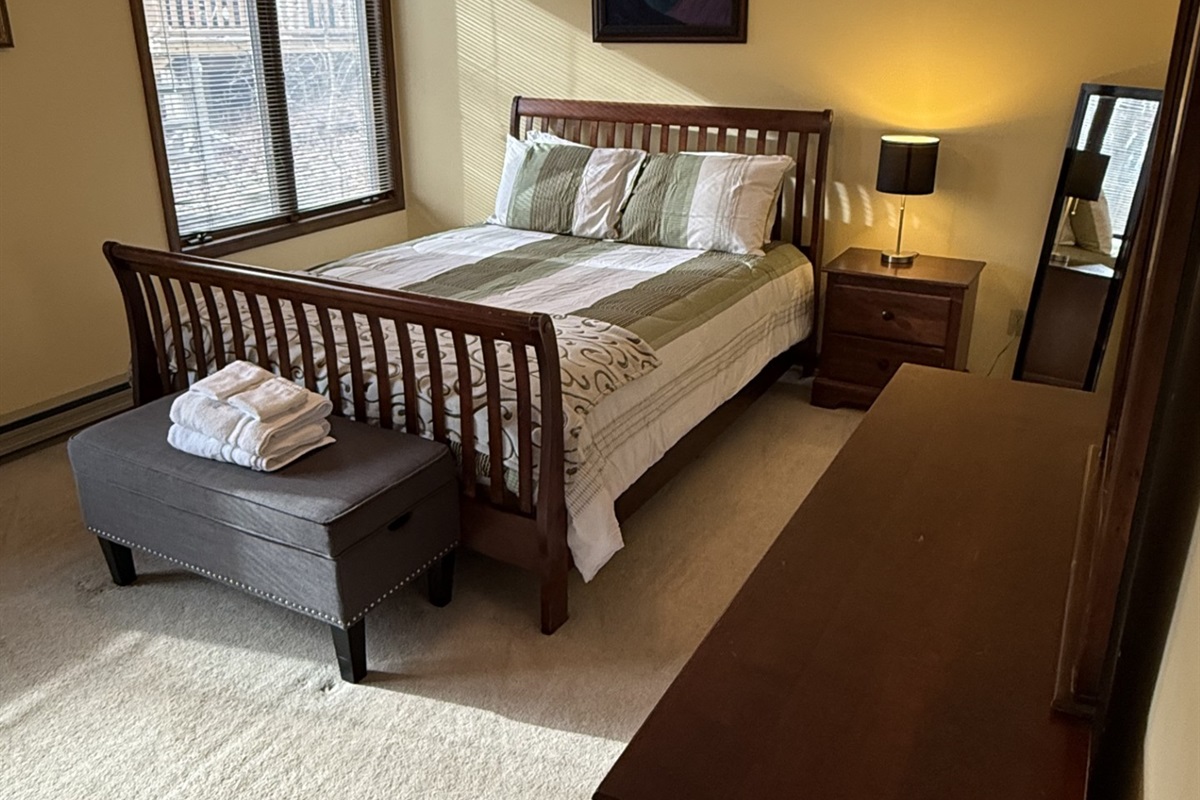 First queen room; connected to bathroom