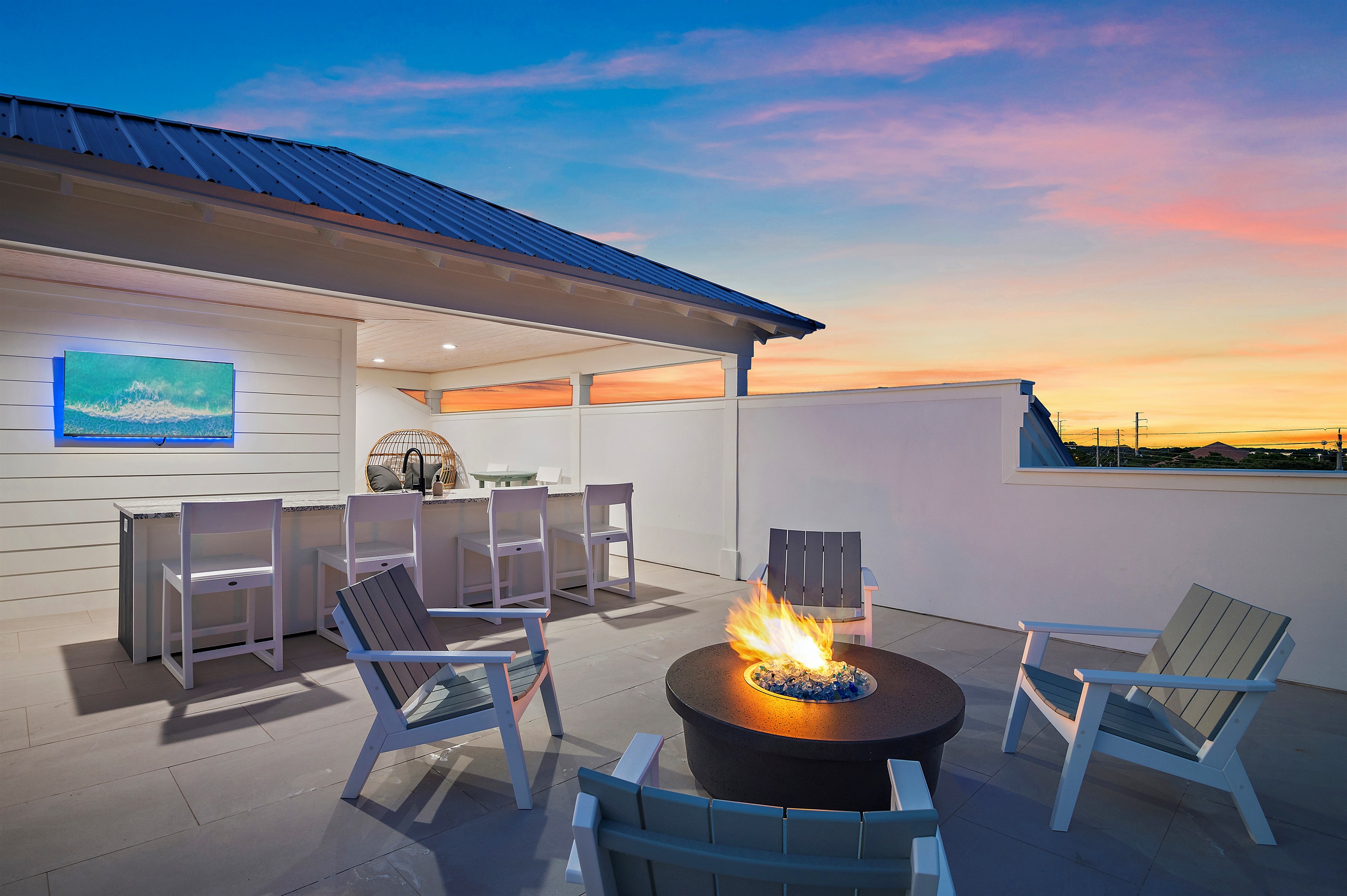 Rooftop Bar with firepit, cozy lounges and stunning gulf views!
