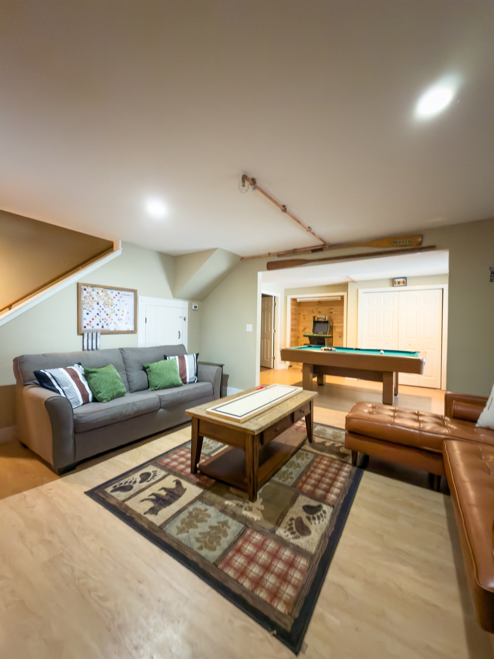 Dual space for gaming and living room in the lower level.