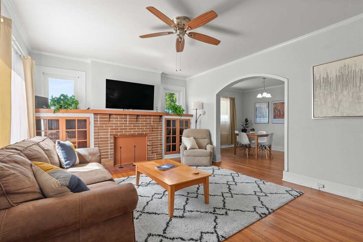 Living room with sleeper sofa and 55" smart HDTV.