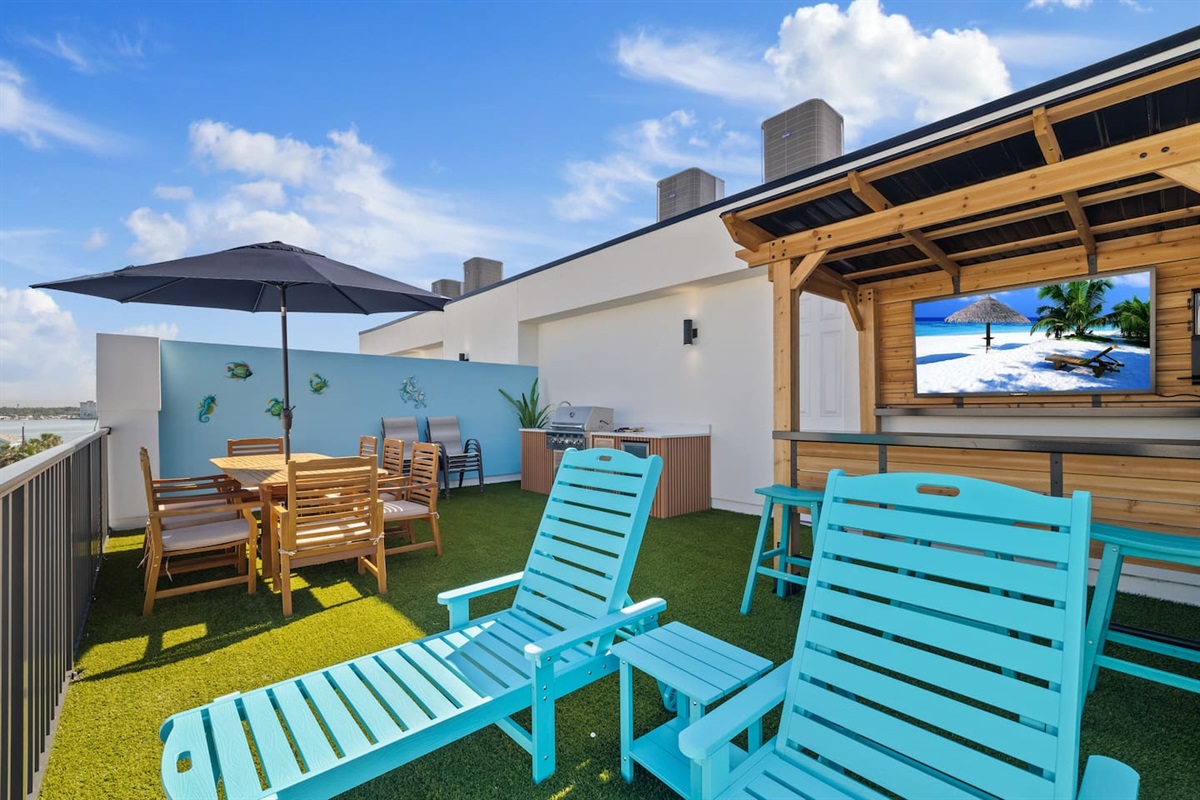 Private rooftop with enough seating to fit everyone you brought (updated with games like ring toss)