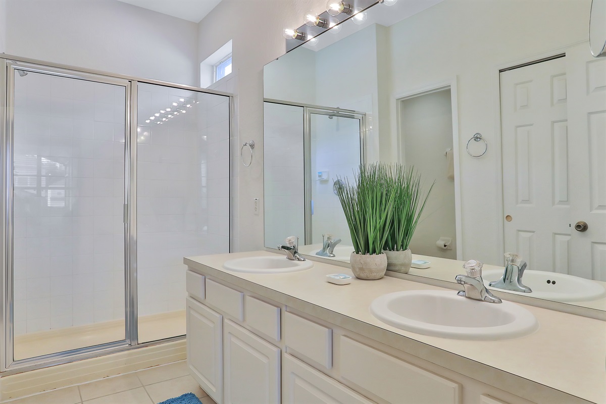 Primary ensuite bathroom with double sinks