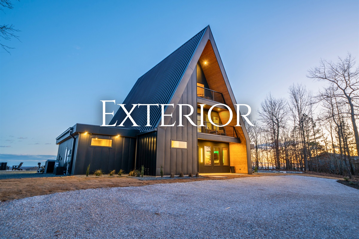 A beautiful exterior shot that shows off the modern A-frame style, with the peaceful setting making it feel like you&rsquo;re truly tucked away in nature.