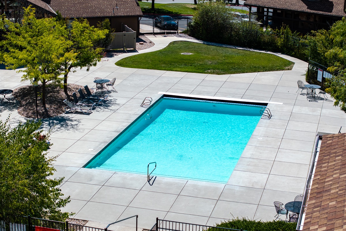 Refreshing outdoor pool surrounded by mountain views.