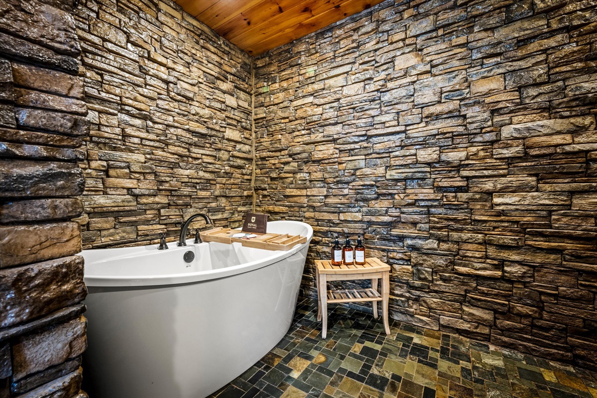 En-Suite Bathroom 2: Spa-like bathroom with a soaking tub and double head shower