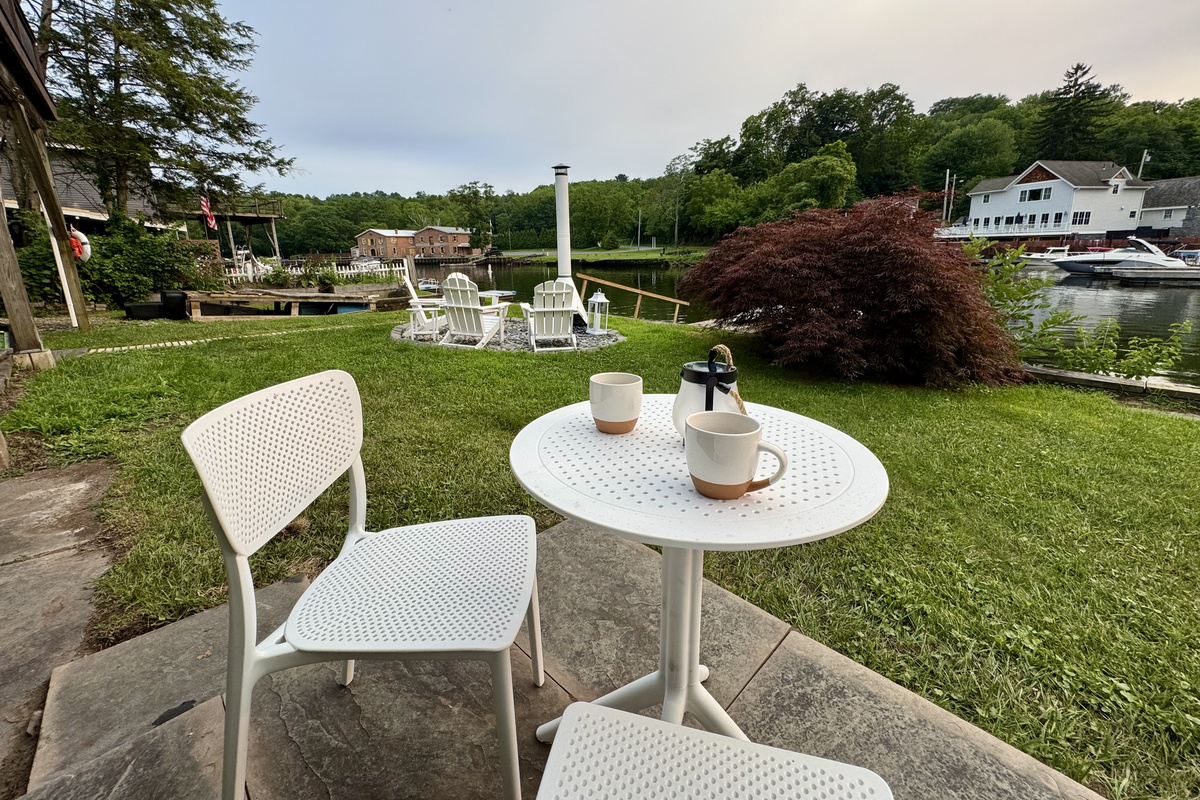 Start your day with fresh coffee and peaceful river views.