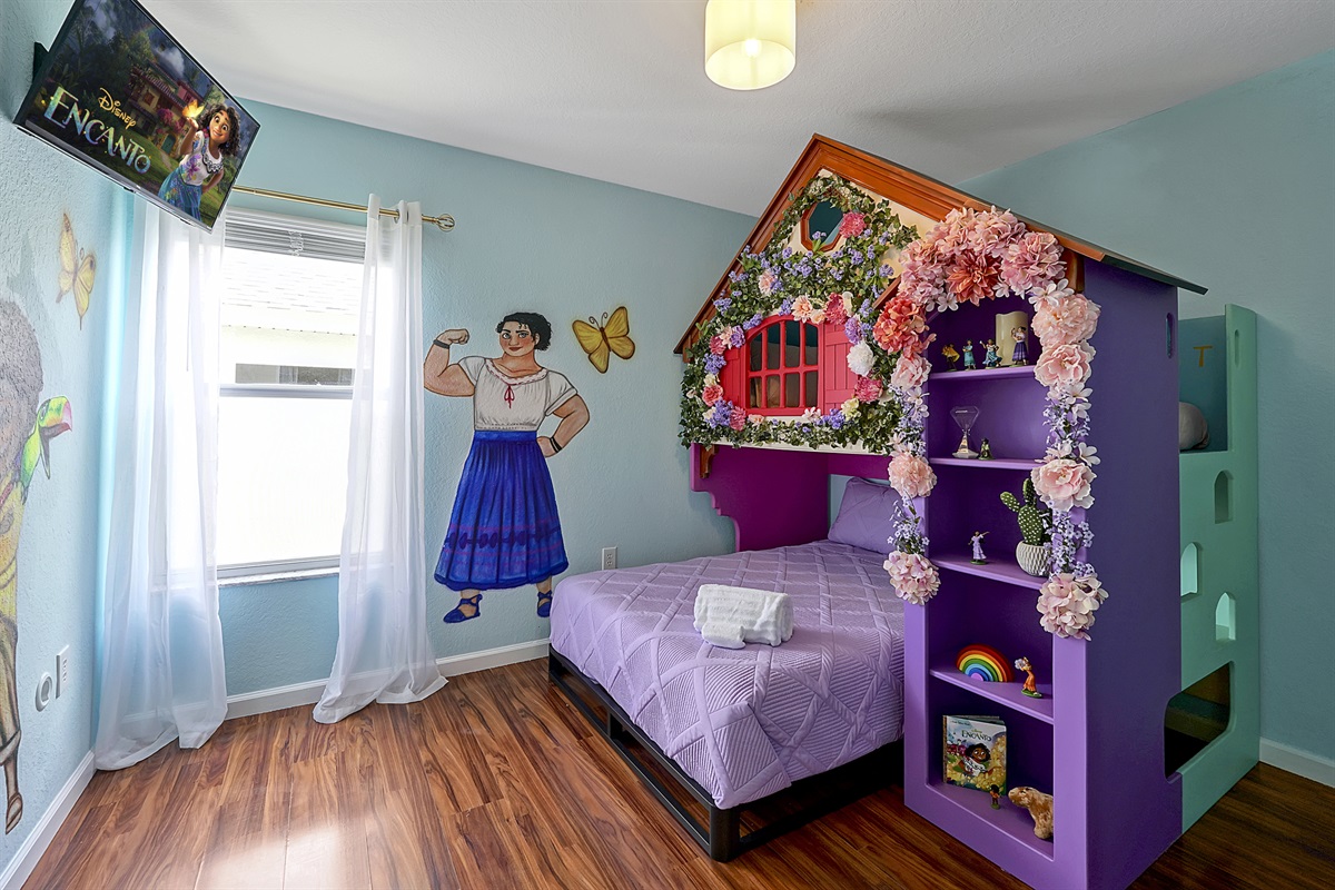 Hola Casita! Your young guests will ooh and ahh over this truly magical space. The twin over full bunk comfortably sleeps 3. Details all throughout the room invoke imagination & invite guests to remember that the true magic in life is family and friends.