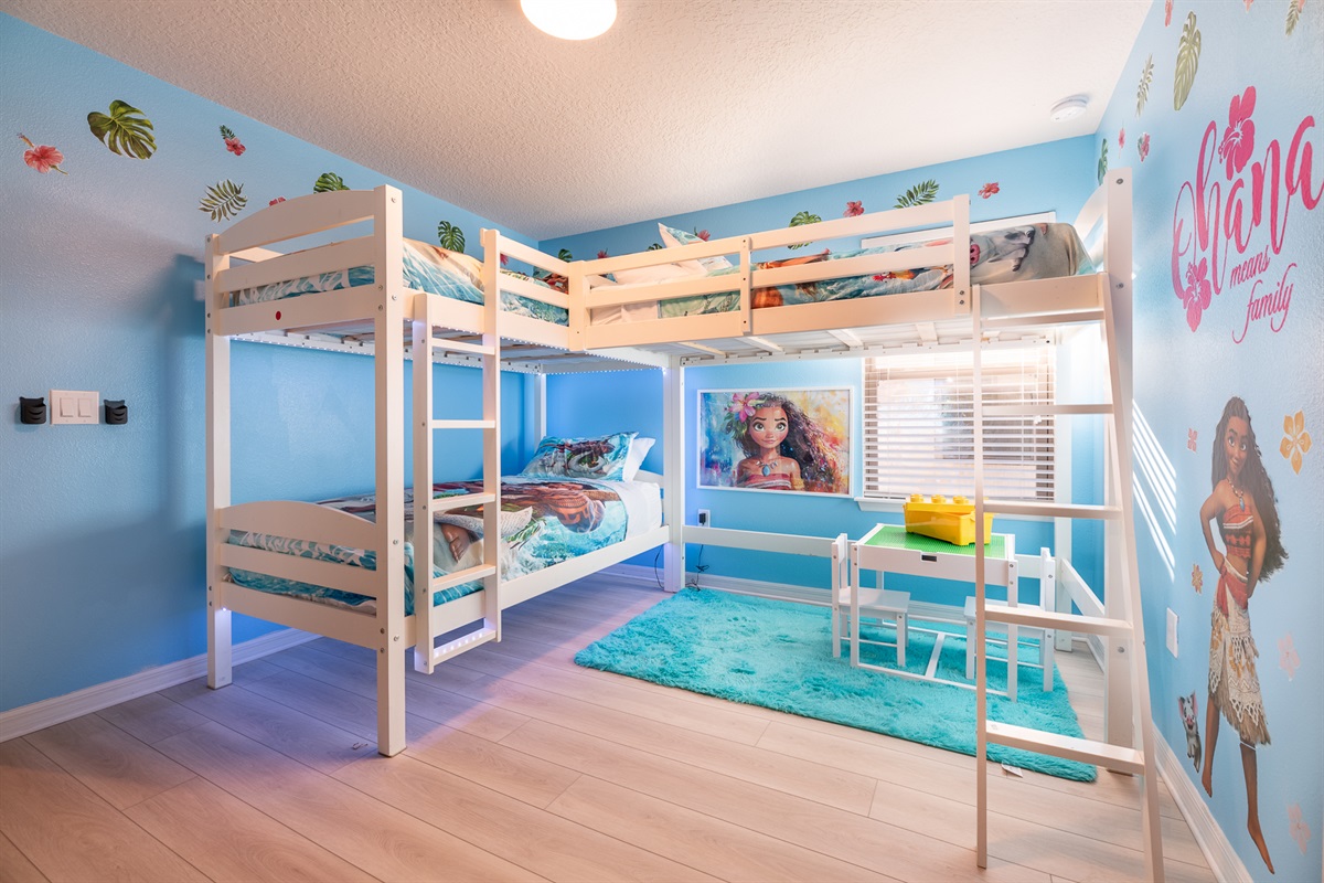 The Moana Bunk features 3 twin beds and and lego table complete with lego