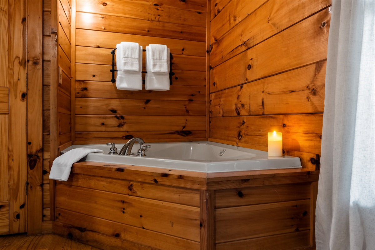 Relax and recharge in the private soaking tub located in the main floor king bedroom.