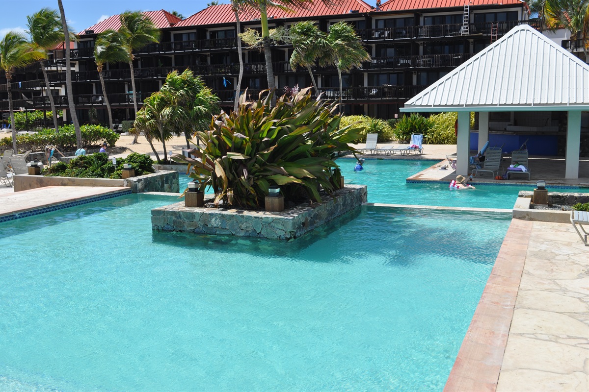 Relax and unwind at the resort-style pool just steps from your villa.