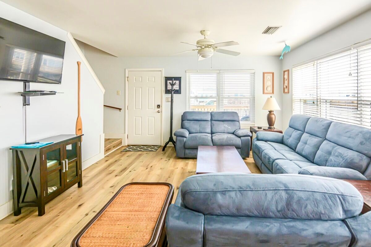 Plenty of comfy seating to relax, watch TV, or plan tomorrow’s beach adventure