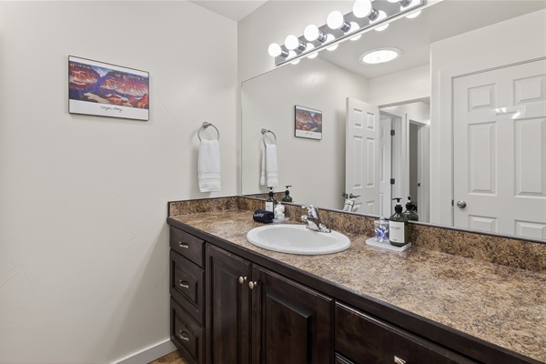Upstairs Shared Bathroom with separate shower and toilet area