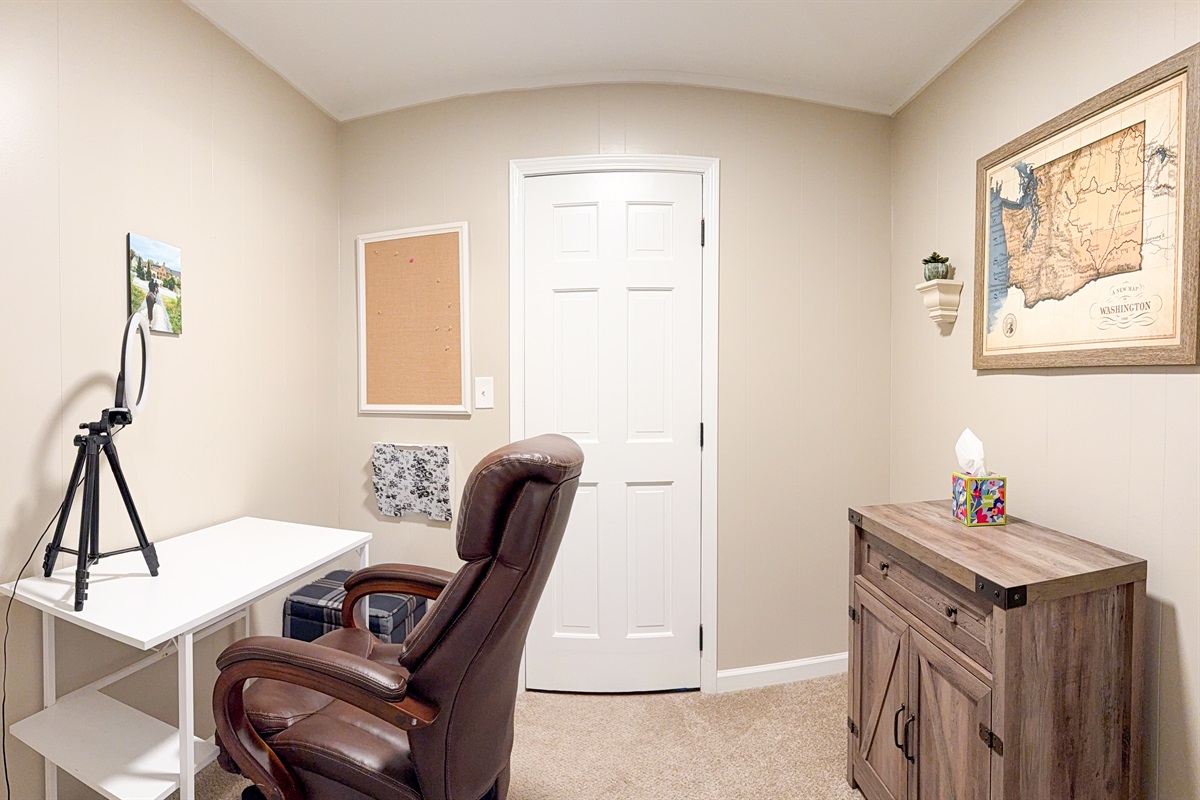 There is a shared office space located upstairs, perfect for work or study.