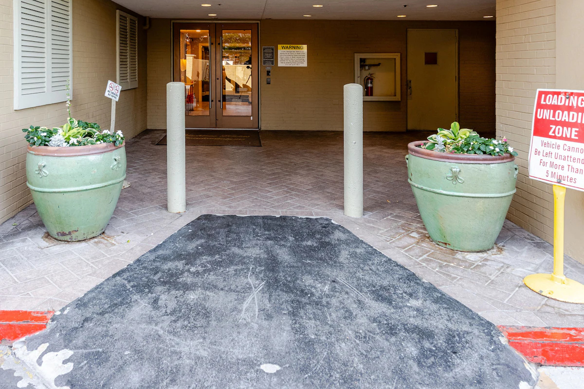 Conveniently access Peachtree Towers through the secure back entrance directly from the parking area.