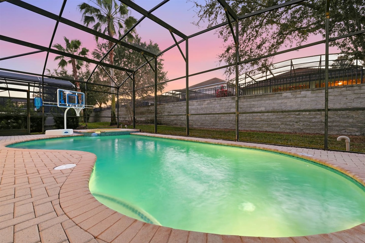 Pool Oasis: Dive into relaxation in your private pool with a sunset view and fun basketball!