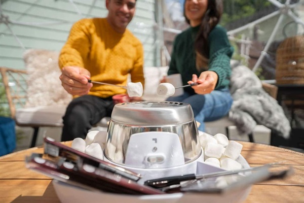 The ultimate winter hangout! Roast complimentary s'mores inside your toast heated snow globe. It's the perfect spot for cozy conversations and winter treats. (available November-March)