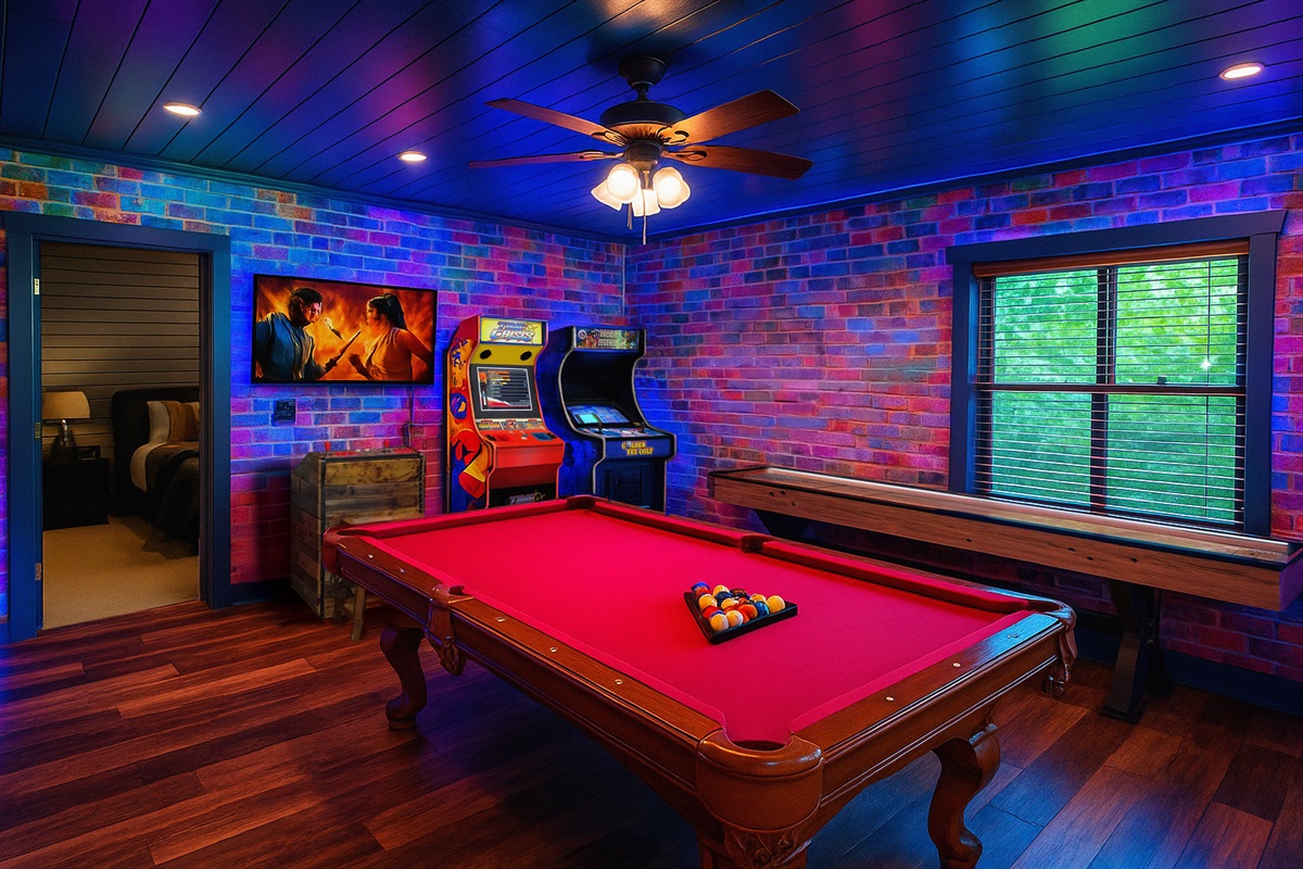 Epic Game Room with 3 Arcades (1200 Games, Time Crisis, & Classic Arcade). A Shuffleboard Table, Billiards table, Darts, Cornhole, and a Roku TV with streaming services. The fun is ENDLESS!