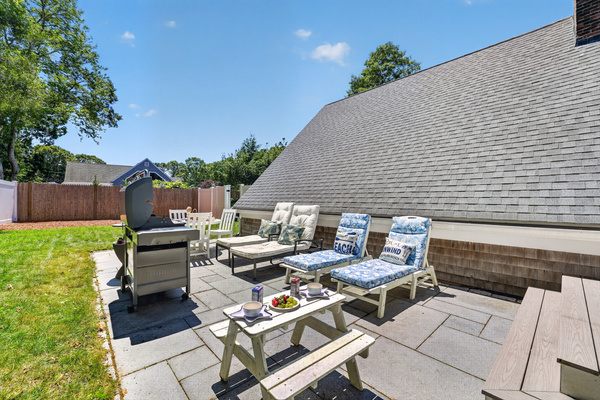 Fire up the grill and enjoy outdoor dining in the spacious backyard.