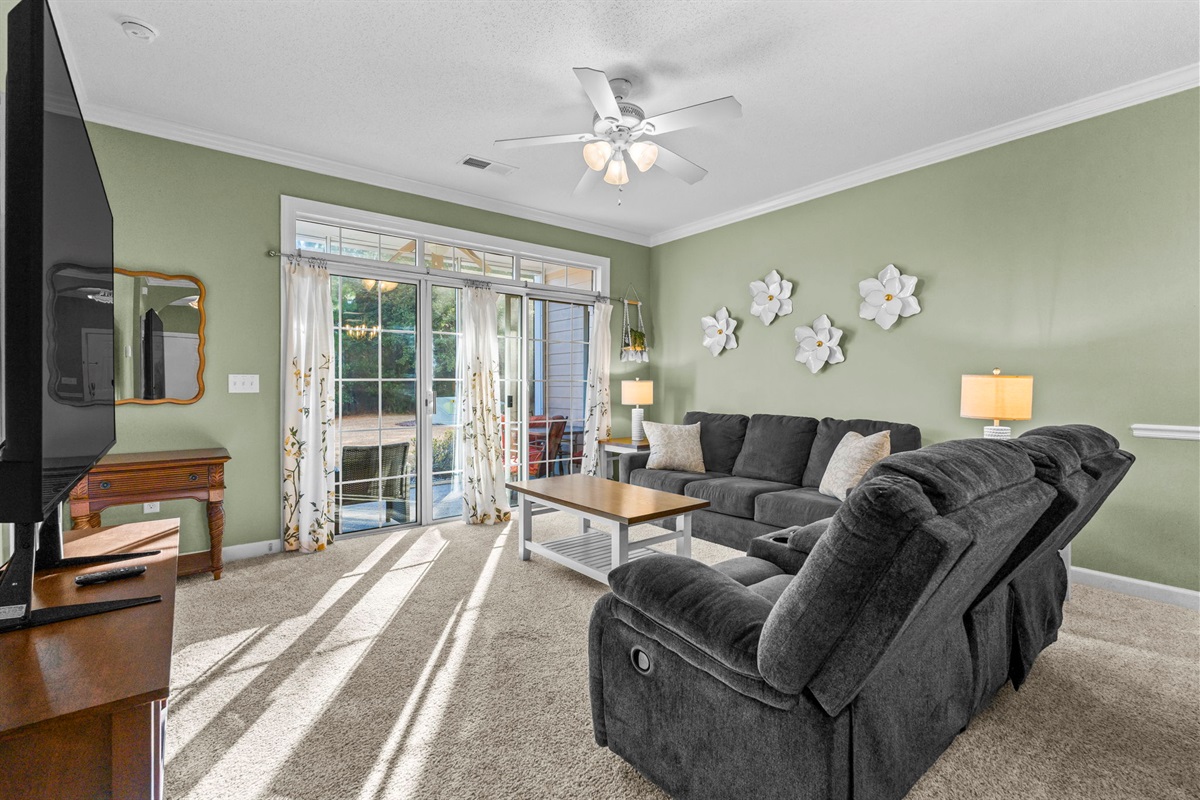 Spacious and open Living area with patio access.