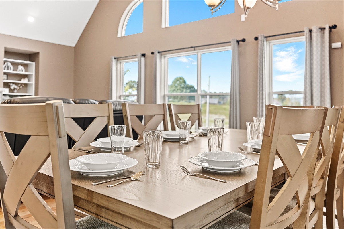 Gather and graze. The dining table seats everyone comfortably - with a view, of course.