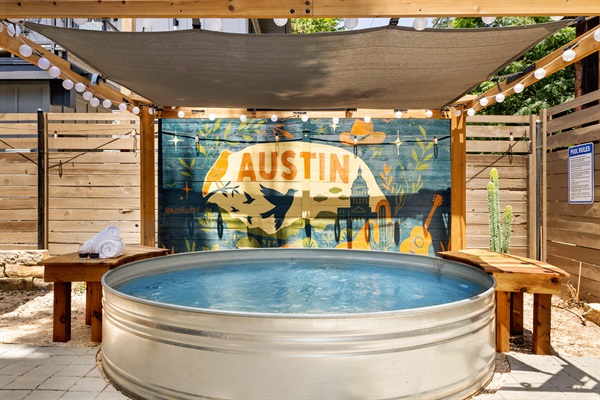 Refresh in the unique Cowboy Pool under twinkling lights and vibrant art!