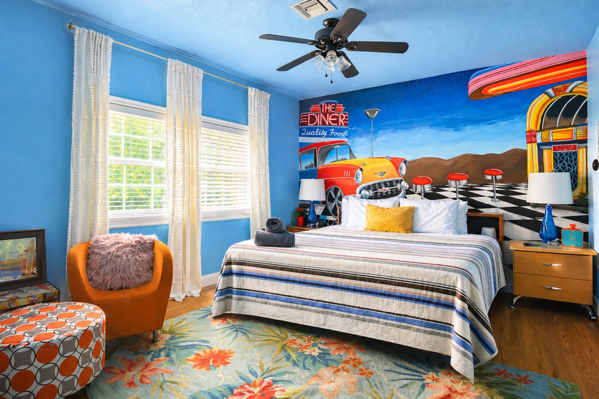 The 50s Room combines retro charm with stunning lake views for a memorable stay.