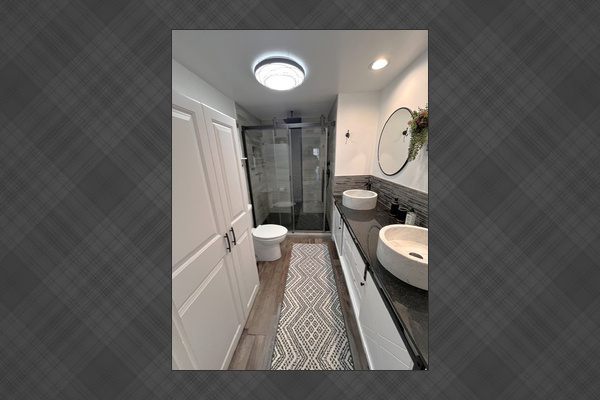 Walk-in shower with rain and handheld heads, instant hot water never runs out.