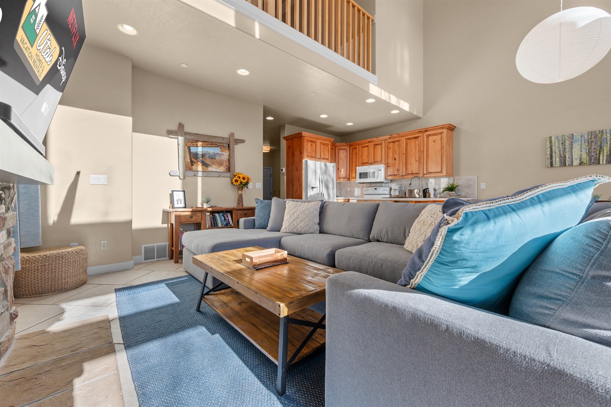 Spacious main living area seamlessly connecting the kitchen, dining, and lounge spaces.