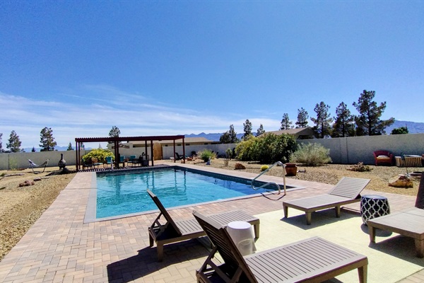 Your private oasis pool and yard with games, seating and beautiful views