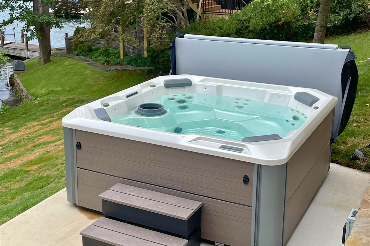 Enjoy the brand new hot tub - a perfect spot to relax after a long day at the lake!