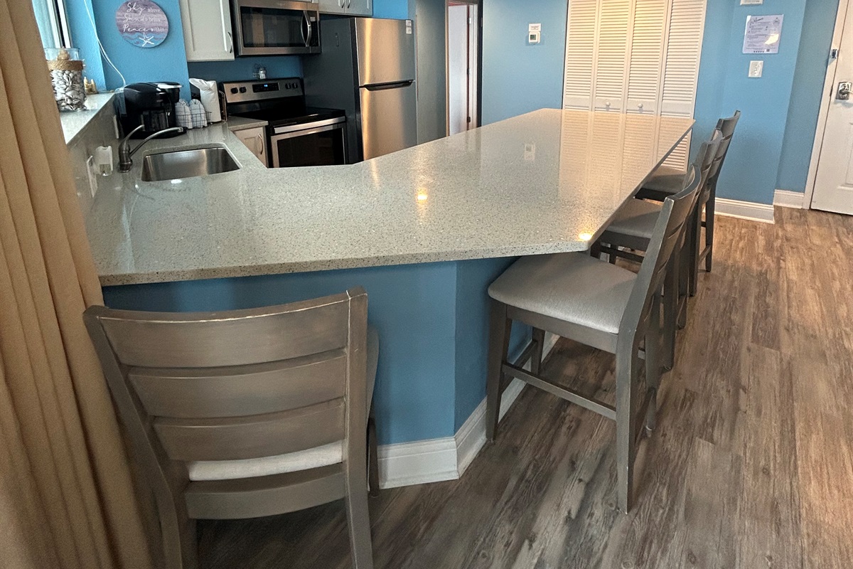 Kitchen with pub style chairs for extra seating