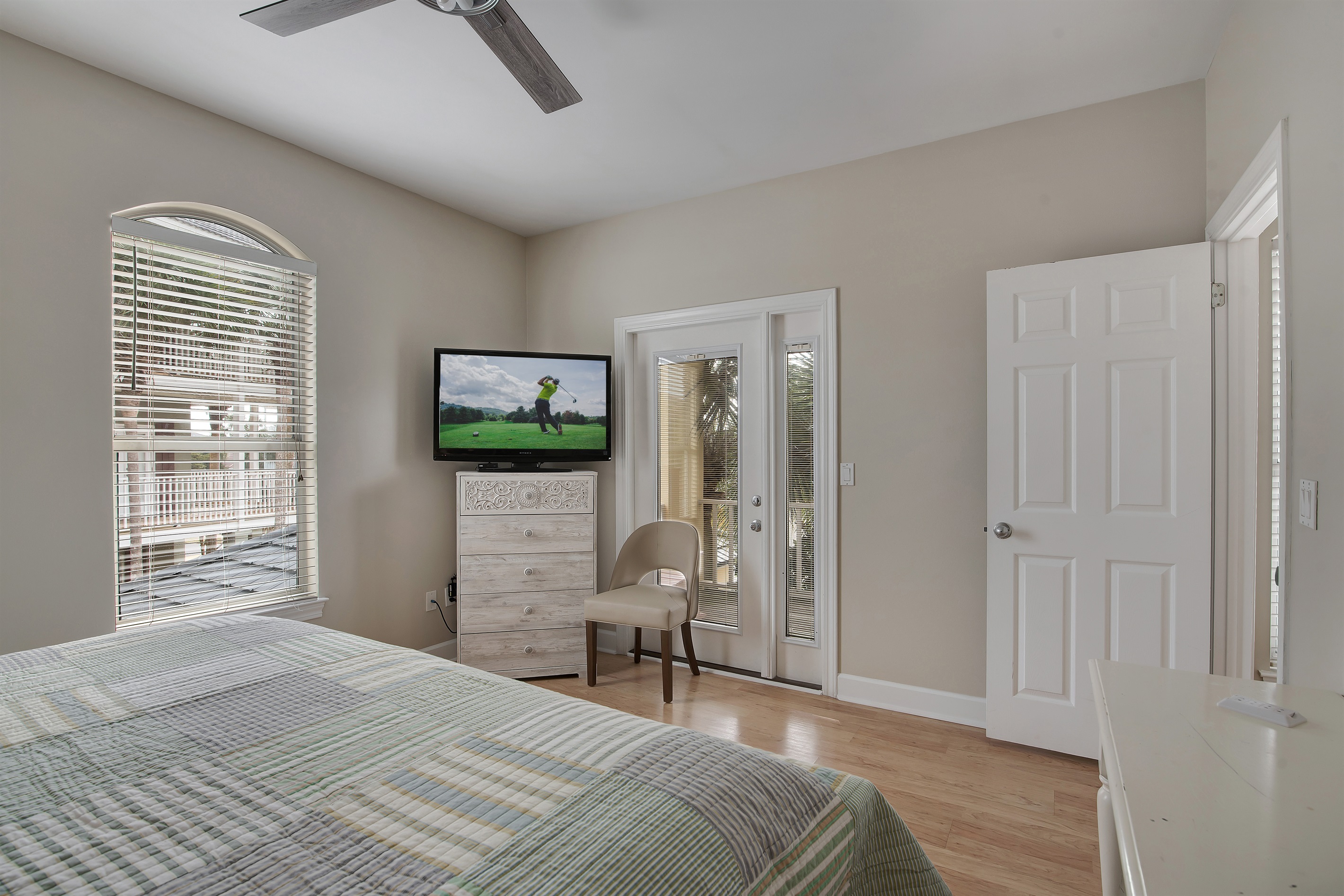 King bedroom with private balcony access and Smart TV