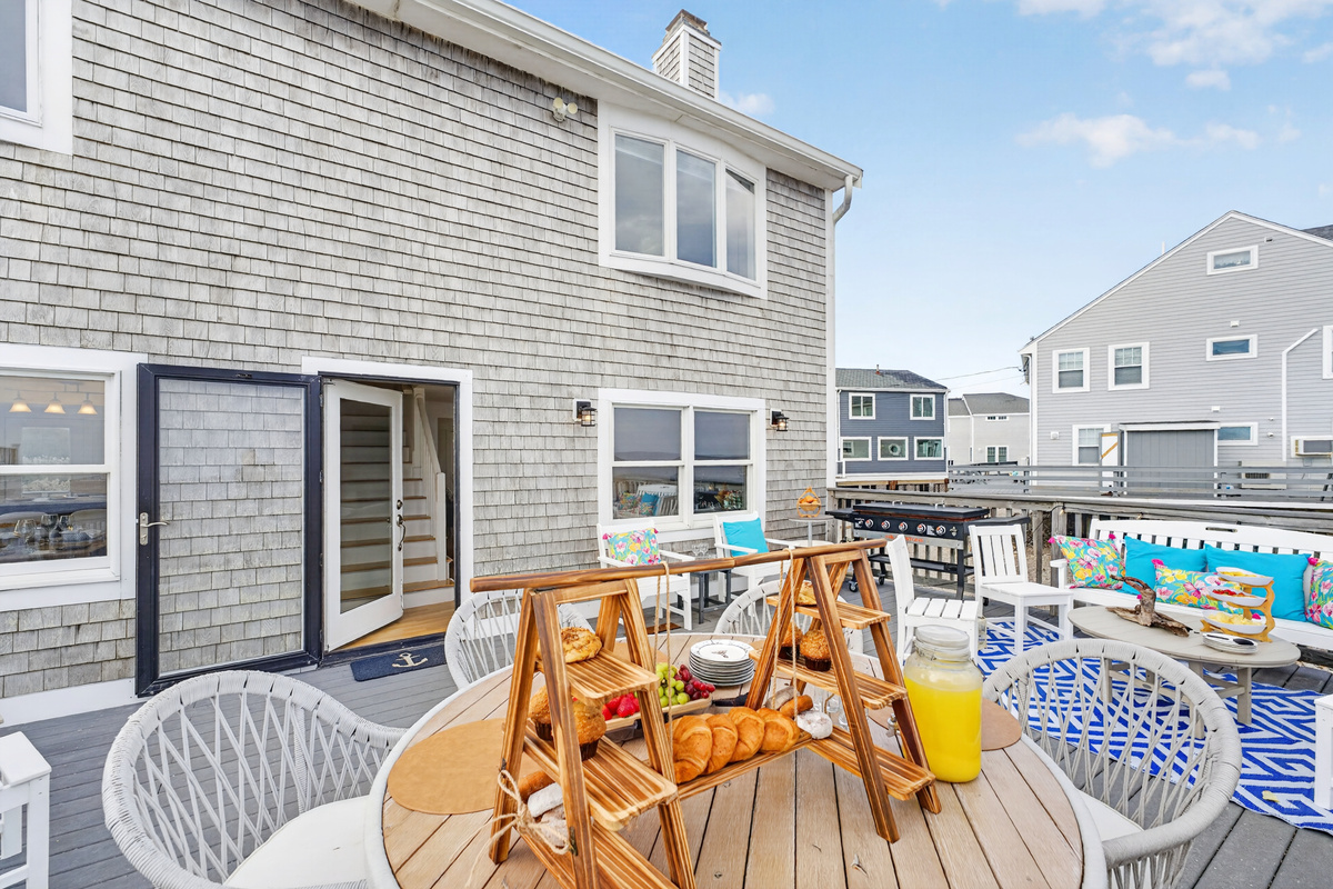 Gather around the deck dining setup for sunny breakfasts and easy outdoor dining.
