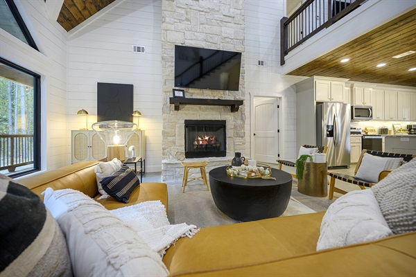 Beautiful large stone fireplace is the centerpiece for your picture perfect stay.