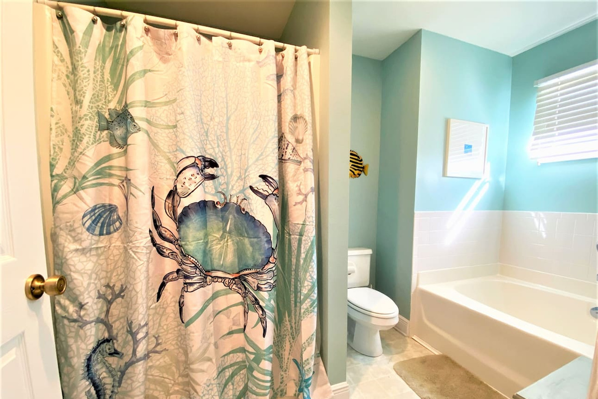Soak in the garden tub or rinse in the separate shower &mdash; your king ensuite has both, and the tub is worth the time.
