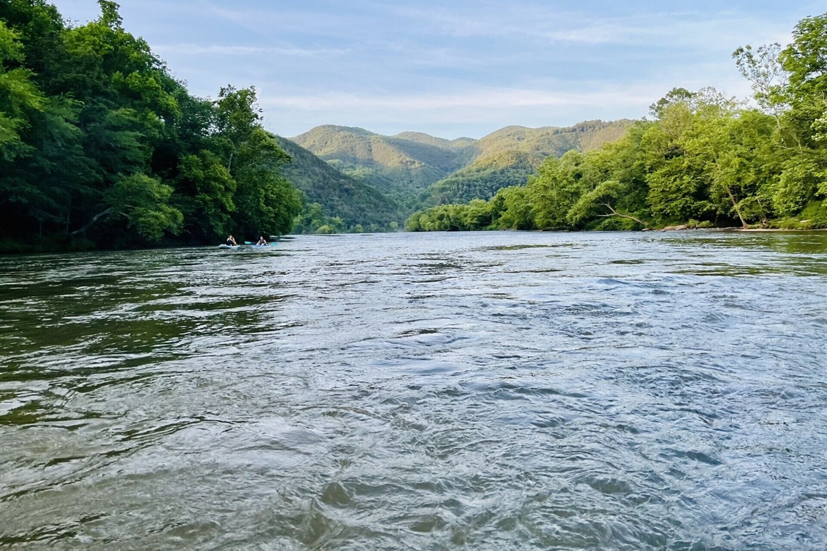 The French Broad River, known for rafting and fishing borders our property