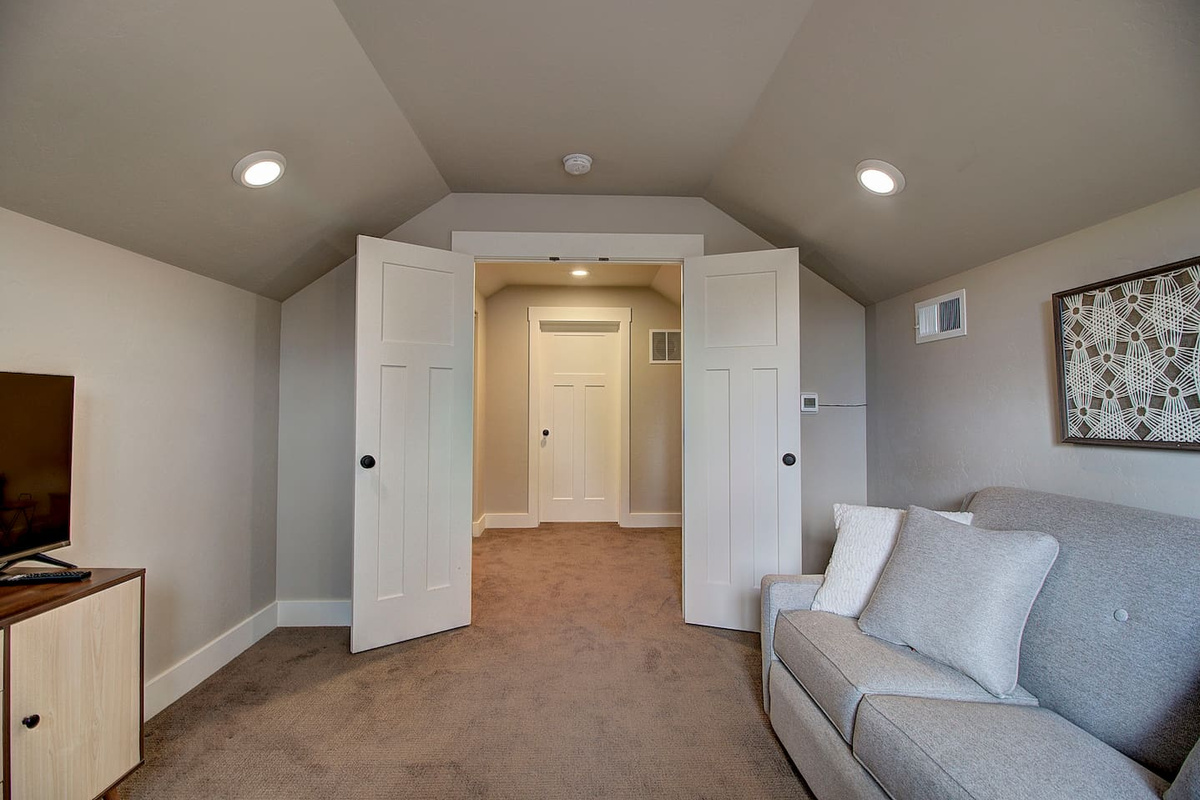 Whether it's a quiet nap or catching up on your favorite show, this bonus room gives everyone a bit of extra room to relax.