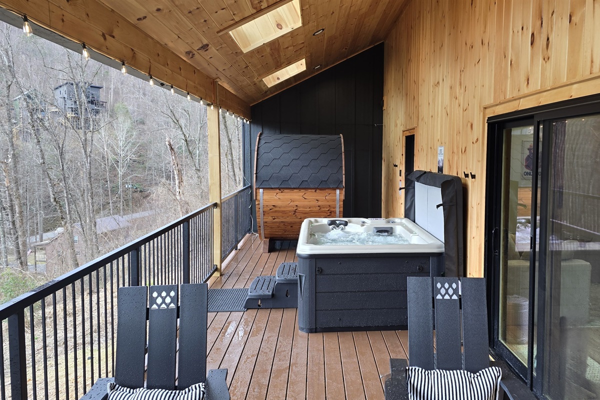 Large, covered deck with string lights