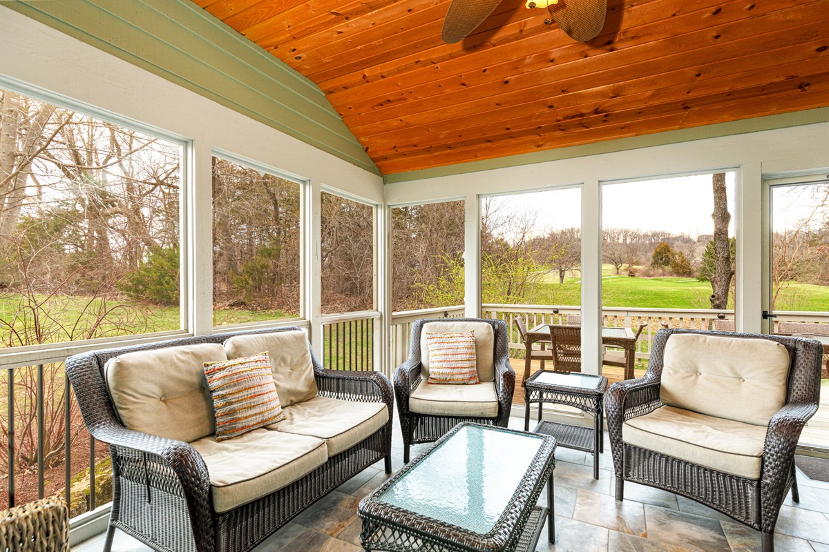 Sip your morning coffee (or your evening wine) on the fabulous screened porch