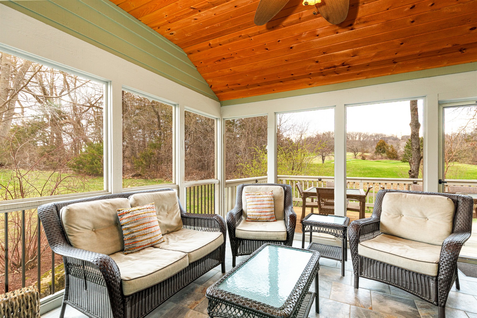 Sip your morning coffee (or your evening wine) on the fabulous screened porch