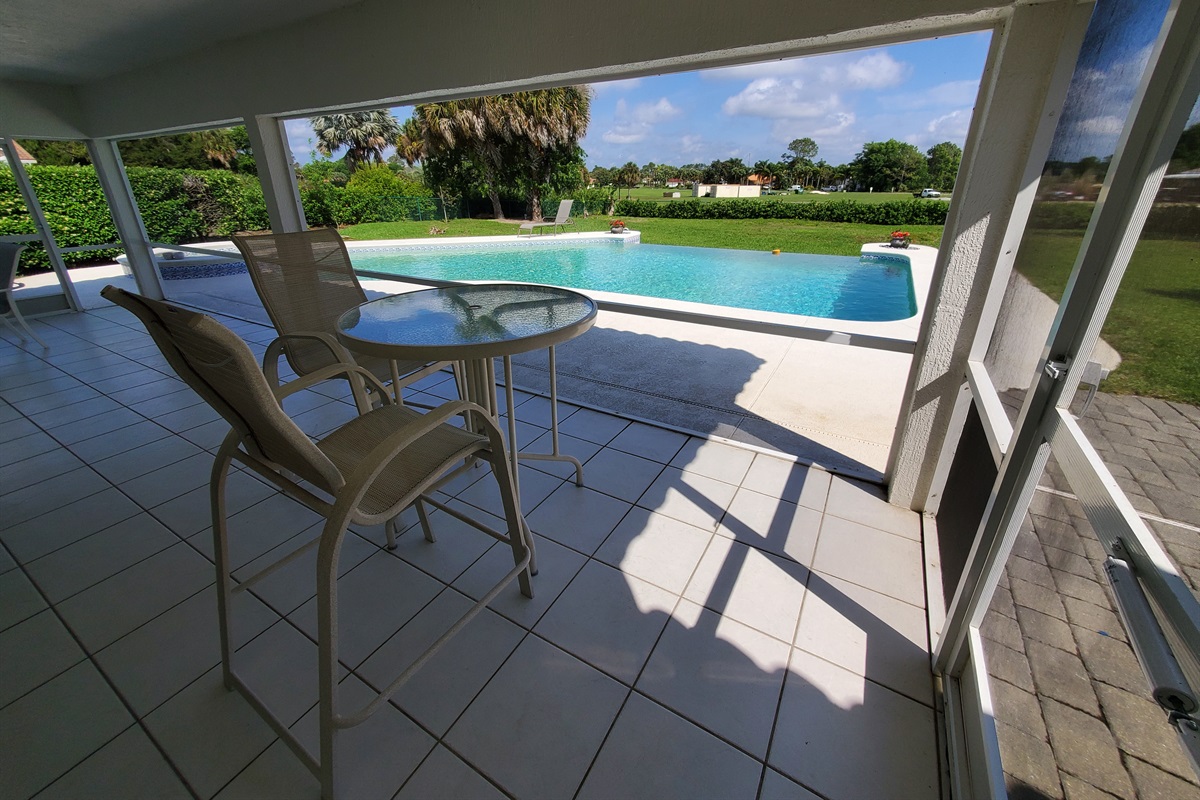 Oversized lanai with lots of comfortable seating