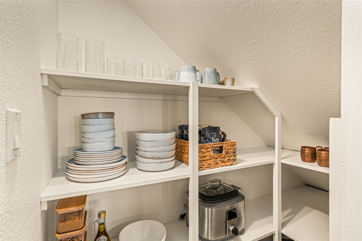 Abundantly stocked kitchen with premium dishware, silverware and appliances. Crock pot, blender, salad spinner, cast iron pans, dutch oven, cooking sheets, spices, OO / BV, oatmeal, walnut and brown sugar and much more! 